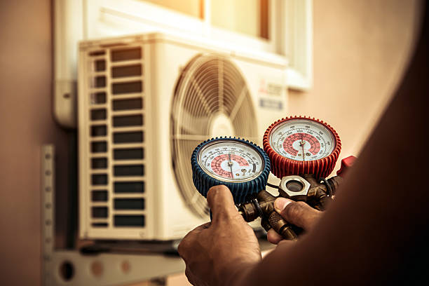 Professional Ac Installation technician working in Comstock, NY